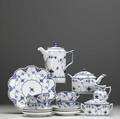Royal copenhagen seventeenpiece blue onion service includes coffee and teapots sugar and creamer six cups and saucers and cake plate teapot handle broken tallest 8 12