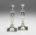 Pair of silver sabbath candlesticks by klost breslau of baluster form on square foot 19th c missing bobeches 162 ot 9 34