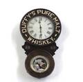 Whiskey advertising clock new haven clock co wall clock with carved bezel frame and painted glass insert promoting duffys pure malt whiskey some overpainting to back of original image and lettering