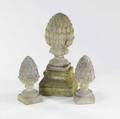 Garden statuary large pineapple finial on base together with two smaller pineapples 20th c tallest 30 x 12 12 sq