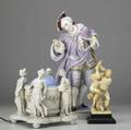 Porcelain grouping three items european male figure in 18th c dress hercules and antaeus statue and figural lamp tallest 18