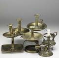 Eight english brass chambersticks in various sizes and styles 19th c largest 7 x 6 14