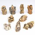 Netsuke and carvings nine ivory and bone netsuke carvings 20th c including one of a samuri clutching an inro on his back tallest 2