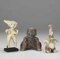 Precolumbian figures three items include two nayarit chinesco seated figures and mother and child on display stand jalisco sheepfaced figure repair to head 200 bcad 200 tallest 5 14