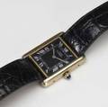 Cartier gilt silver mens watch rectangular black face with silver roman numerals and hands blue cabochon on stem cartier black leather band