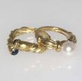 Tiffany  co two gold rings 18k yg signature ring with pearl 725mm size 4 bypass ring with cabochon sapphire terminals size 6 12 93 gs gw