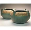 Style of weller two fourhandled jardinieres in matte green glaze with floral motif 9 x 14 12
