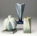 Roseville futura lotus ball vase tapering triangular vase and vase with twisting shape tallest 9 14