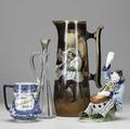 China painting etc four assorted items tall willets belleek chinapainted tankard with tavern scene signed a newbury italian majolica clown figurine unmarked crystal decanter with silver stoppe