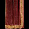 Arts  crafts textiles four burgundy velvet curtains with floral tapestry applique lined in chartreuse wool and one portiere lined in same burgundy velvet together with three curtains of woven char