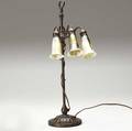 tiffany studios early threelight lily lamp with a fluted and patinated adjustable bronze base and three assembled art glass shades with green leaf pattern mint original patina one asis unmarked