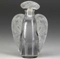 lalique extremely rare oreilles lezards perfume bottle of clear and frosted glass c 1912 lots 352 and 353 found in a vintage clothing store are the only known examples of lalique oreilles lzar
