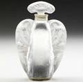 lalique extremely rare oreilles lezards perfume bottle of clear and frosted glass c 1912 lots 352 and 353 found in a vintage clothing store are the only known examples of lalique oreilles lzar