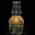 george ohr totemic bottle covered in spongedon teal blue glaze on amber ground the middle with copperdust striations stamped ge ohr biloxi miss 7 x 3 12