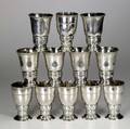 a halberstadt  skonvirke twelve silver goblets by assayer christian f heise in two similar patterns each hammered and raised body tapering to ring foot 1916 marked for dansk abejde 355 ot 5