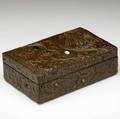 arts  crafts fine and unusual copperclad box elaborately decorated with repousse bird of paradise against a floral background bejeweled with paste cabochons crack to wood on bottom chip to back