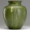 grueby exceptional large vase by ruth erickson with three yellow daffodils and light green leaves against a rich curdled organic matte green ground 1914 overfired area near bottom grueby pottery