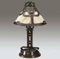 handel rare hammered copper boudoir lamp its shade with pierced and riveted tulips hanging from hinged hooks on a single sconce base with double stem and lined cutouts these early examples are ma
