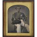 Portrait of a decorated naval officer with sword handtinted quarterplate daguerreotype cased image