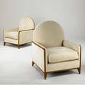 Juan montoya pair of club chairs upholstered in cream chenille on wood frames provenance juan montoya collection 42 x 33 x 33