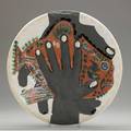 Picasso  madoura glazed faience charger embossed with hands cupping a fish stamped madoura empreinte originale de picasso plein feu and incised im 129250 madoura 12 34 ar 215