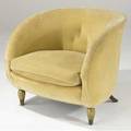 Robert couturier attr barrel chair upholstered in cream velvet with gilded and painted front legs and rear sabre legs 28 x 32 x 24