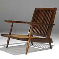 George nakashima english and black walnut cushion chair ca 1966 provenance toby royston folly cottage exton pa copy of original invoice available signed with clients name 31 x 30 12 x 3