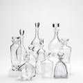 Orrefors etc ten piece decanter group includes orrefors one kosta boda two strombergshyttan and one similar six signed orrefors tallest 10 12