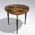 Erno fabry associates occasional table with exotic wood inlay together with sculpted italian walnut cocktail table unmarked 19 34 x 22 dia and 15 x 60 x 20