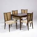 Baker etc fivepiece furniture suite consisting of a baker game table and four side chairs with caned backs and embroidered seat pads game table marked with baker metal tag 29 x 32 sq and 35