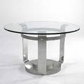 Style of karl springer brushed and chromed steel dining table with plate glass top and brass decoration 29 x 48 dia