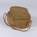 A Lidded Native American Basket with Handles