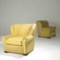 Art deco pair of oversized club chairs with silk upholstery on dark wood bun feet 36 x 40 x 41