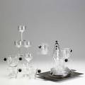 Art deco glassware twentysix pieces include heisey glass with bakelite disc in handles four coffee glasses with saucers creamer and sugar five wine glasses four shot glasses wilcox square silve