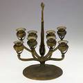 Tiffany studios parcel gilt bronze eight cup candelabrum with snuffer medallion stamped tiffany studios new york 11646 1294 15 12 x 14 12