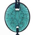 Lalique guepes green glass pendant with whitish patina replaced cord 1920 m p 578 no 1650 etched r lalique 2 14 x 1 78