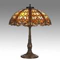 Duffner  kimberly leaded slag glass and patinated bronze table lamp with curls and treillises unmarked 24 x 20