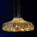 Arts  crafts leaded glass and bronze chandelier six sockets unmarked shade 10 12 x 24 12 dia total 41 12