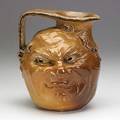 Robert w martin martin brothers face jug 1903 12 kiln kiss to one cheek several shallow firing lines rw martin  bros london  southall 14101903 7 12 x 6 12