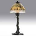 Handel bronze and chipped glass boudoir lamp obverse and reversepainted shade on tree trunk base shade signed handel 5624 base felted 15 x 7