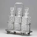 Decanter set john round and sons footed silver plate with hinged handle and three leaded cut crystal decanters 19th c 12