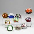 Ten art glass paperweights baccarat sulphide of peter the great baccarat sulphide of charlemagne 1976 maude and bob st clair orange and purple floral vandermark green purple and yellow millefiore