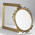 Two gold framed mirrors one with carved frame 20th c larger 38 x 31