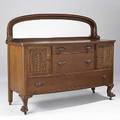 Oak sideboard mirrored top applied carvings and leaf pulls ca 1900 55 x 66 x 23