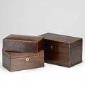 Three tea caddies in various woods tallest 5 38 x 9 x 5