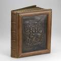 19th c german photo album elaborate handdecorated family album of emil max mayer his wife johanne and their children full leather hinged binding with inset coat of arms and pressed leather panel