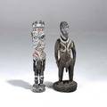 Two new guinea carved wood figures kararay demon or bush spirit together with an ancestral figure from the sepik river area both with natural pigments taller 29