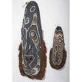 Two new guinea carved wood masks sepik river area larger from the iatmul people smaller with grass attachments both with natural pigments larger 44