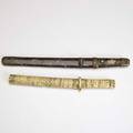 Asian daggers one tanto style with goldstone cloisonne sheath and grip with tempered blade the other with bone sheath and handle longer 14 34