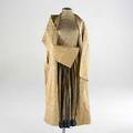 Clothing and textiles four neareastern pieces robe gold thread silk fabric mens silk overskirt and pants 19th c